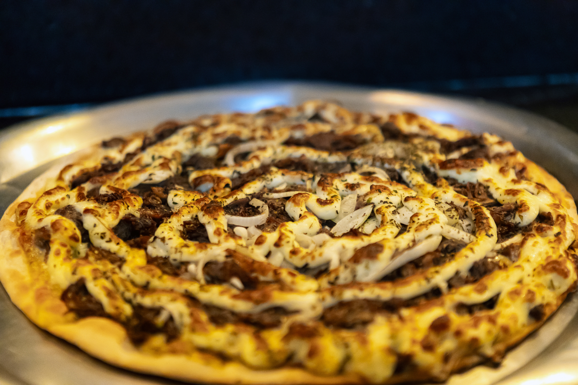 Pizza servida na pizzaria do Village Inn